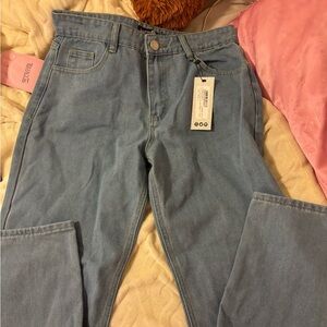 medium wash, relaxed baggy/straight leg jeans